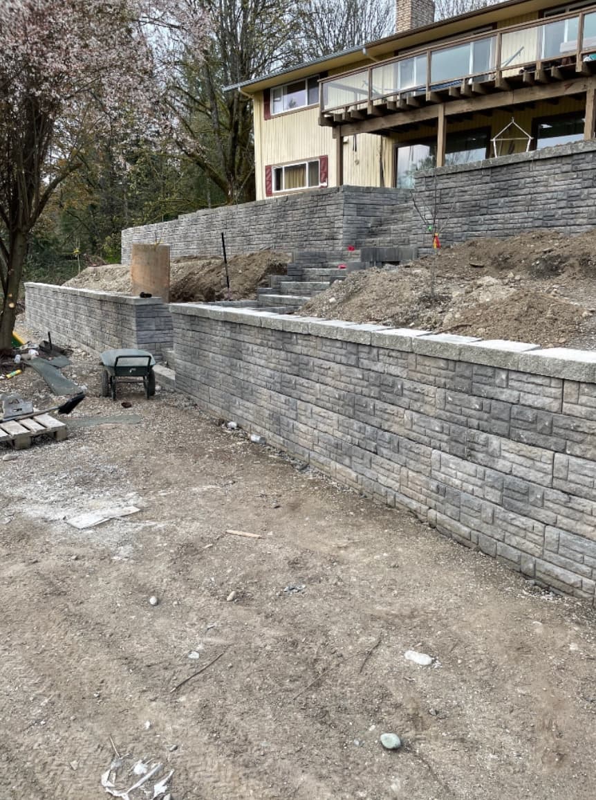 Retaining wall project before the yard was fully finished